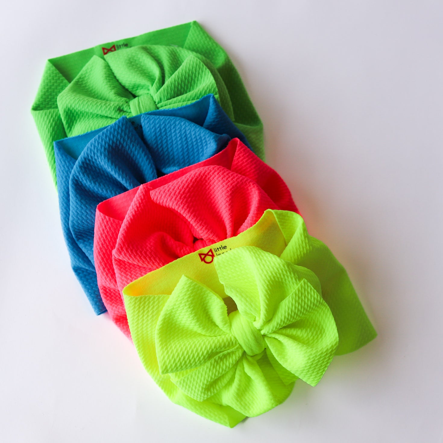 Set of colorful hair bows on a white background